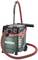 A green industrial vacuum cleaner with a red hose, black casing, switch and carrying handle, standing on two wheels. Brand 'Metabo'.