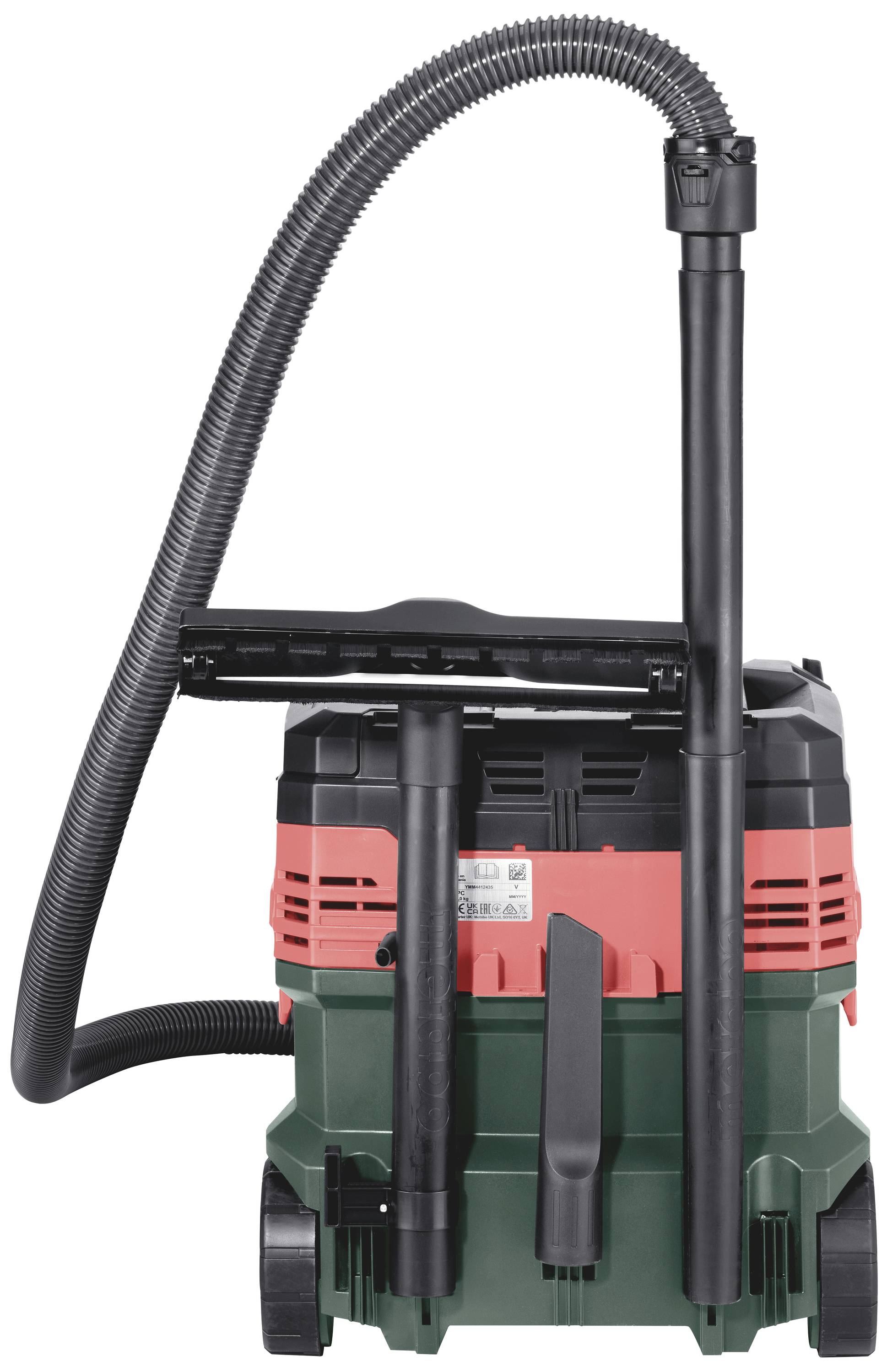 Industrial vacuum cleaners in black, green and red with hose mounted on top. Suitable for workshop or construction site cleaning.
