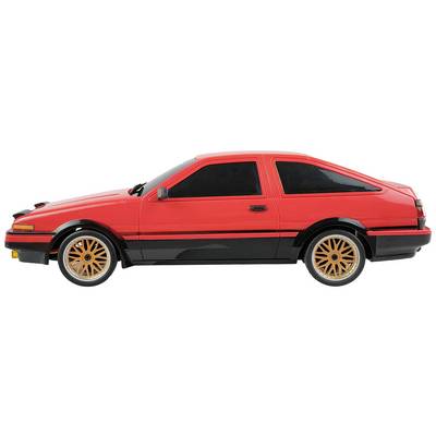 Red model car with two doors and gold-coloured wheels, side view.