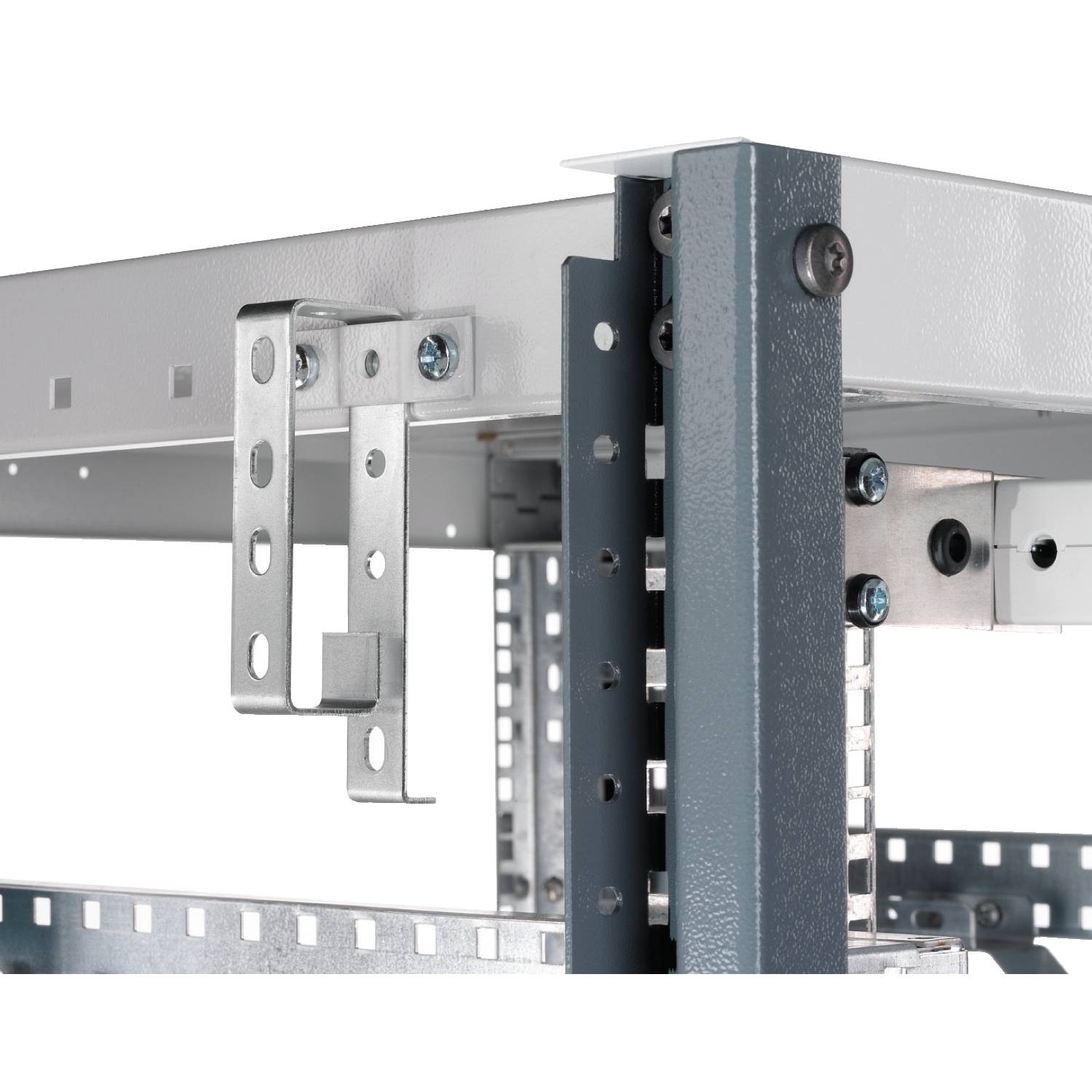 Close-up of a grey metal shelving unit with sturdy struts and screws. Suitable for storing and organising tools.