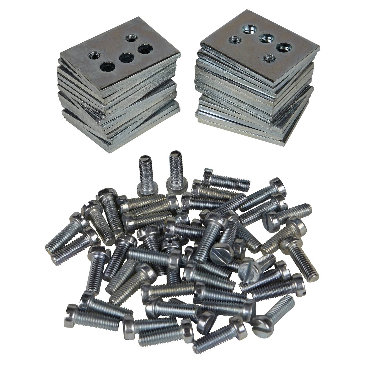 A stack of metal plates with holes beside a variety of screws on a white background.
