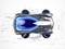 Futuristic toy car with a blue cockpit and sleek design, set against a technical, schematic background graphic.