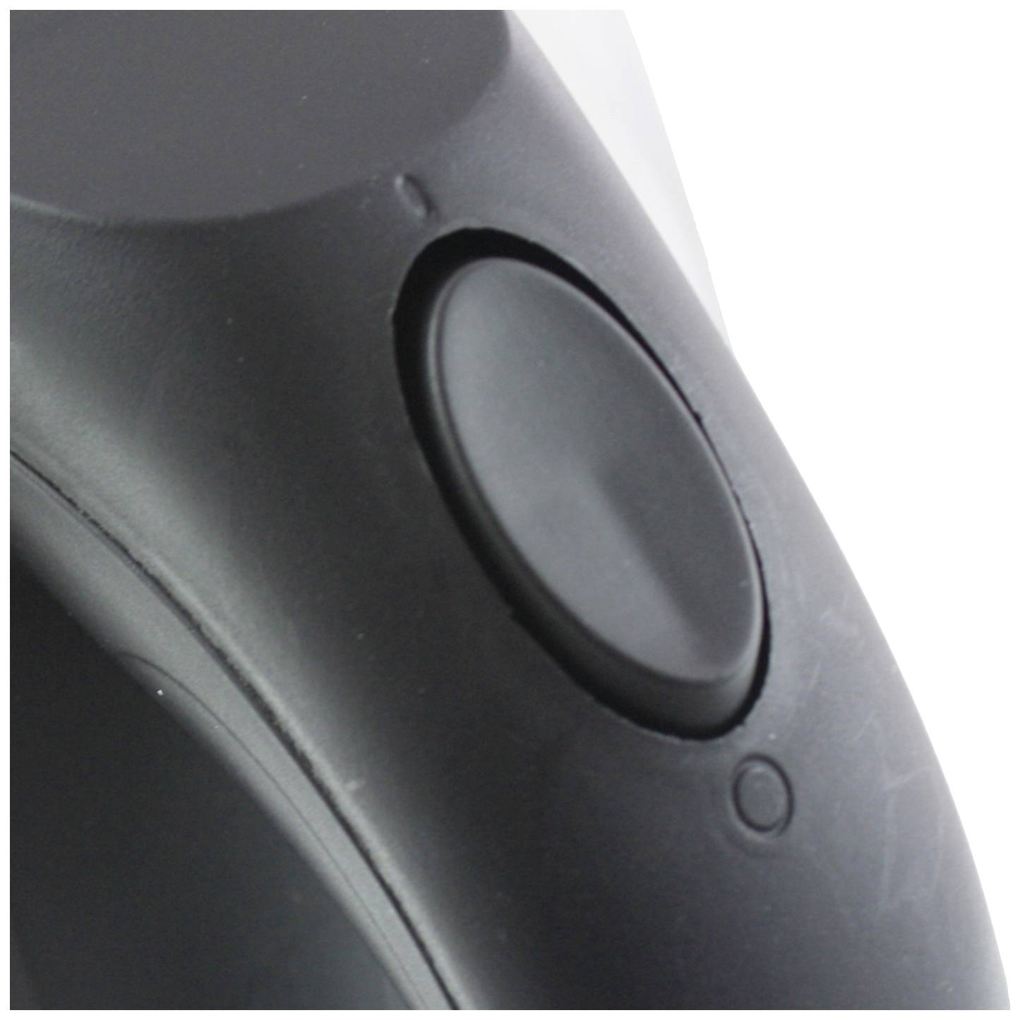 Black computer mouse with visible scroll wheel and a slight scratch on the surface.