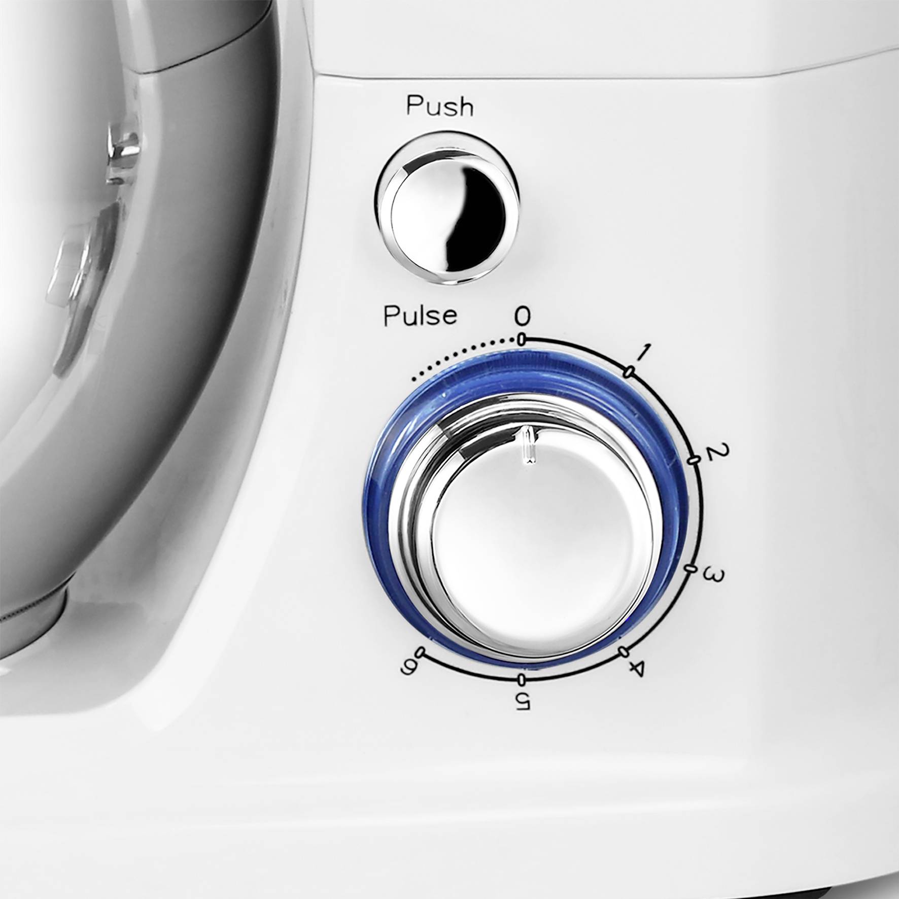 Close-up of a kitchen mixer with control buttons and a rotary dial for speeds ranging from 0 to 3.