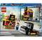 LEGO set with burger truck and food stall. Two figures are standing in front of the stand; one wearing an apron. City background with pavement.