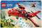LEGO City Fire Rescue Plane Set 60413. Shows a red firefighting aircraft dropping water blocks onto a burning tree. Suitable for ages 6 and up.