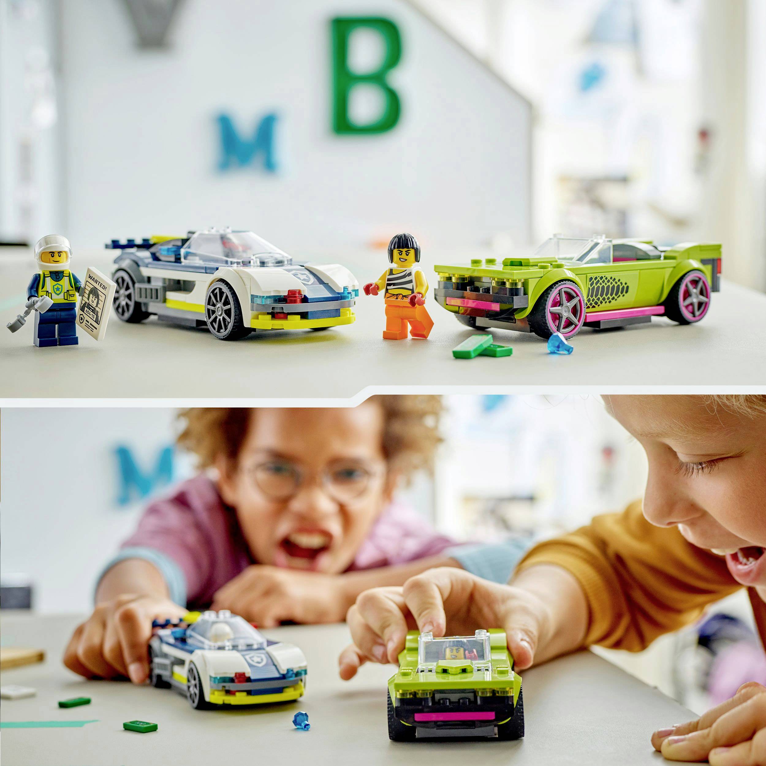 Children play with colourful toy cars and figures. Two toy cars and figures are standing on a table. A child smiles enthusiastically.