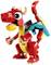 A colourful red dragon, composed of building blocks, with wings and pointed horns, stands upright and looks friendly.