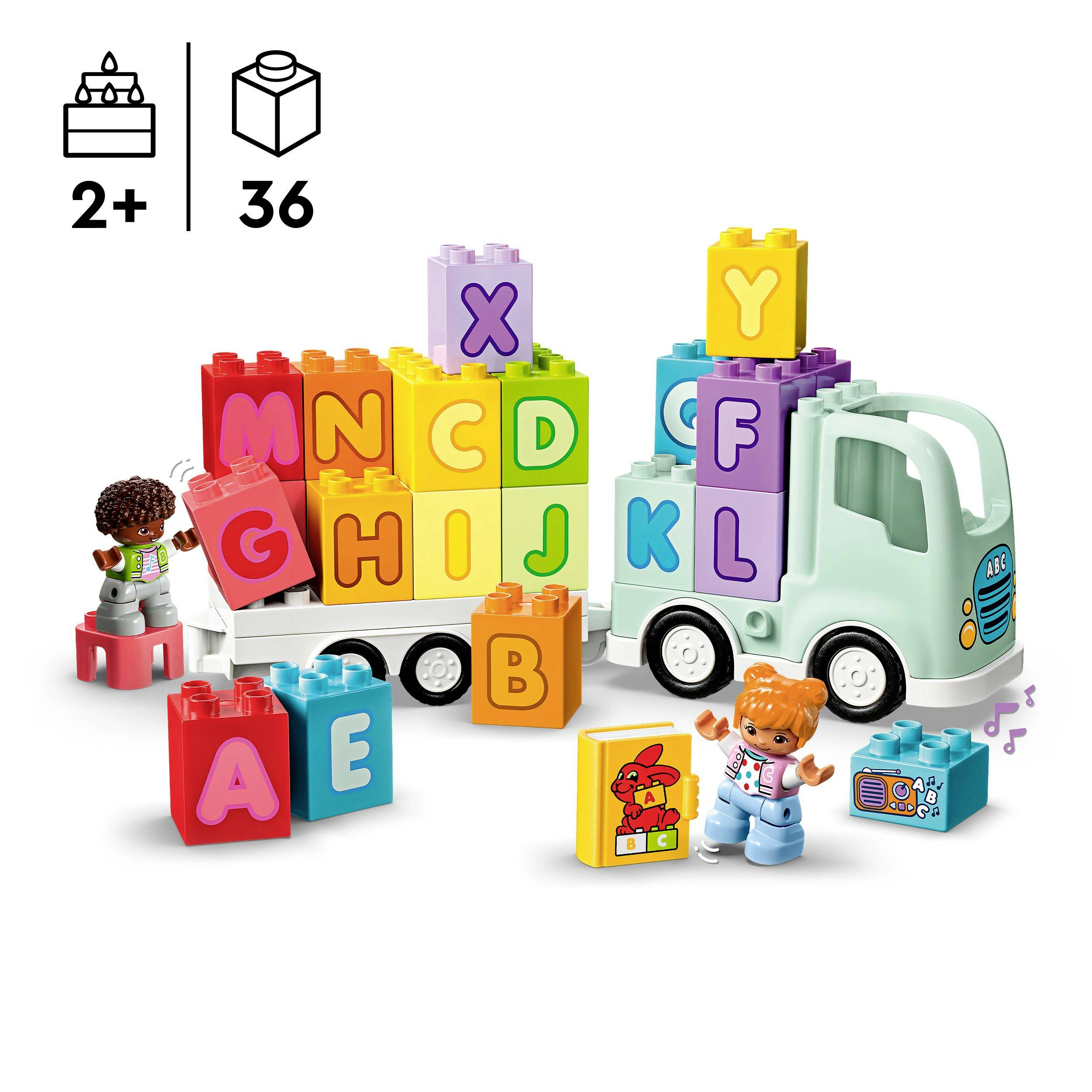 Colourful building blocks with letters and numbers, constructed as a lorry. Two child figurines are interacting with it. Suitable from 2 years of age.