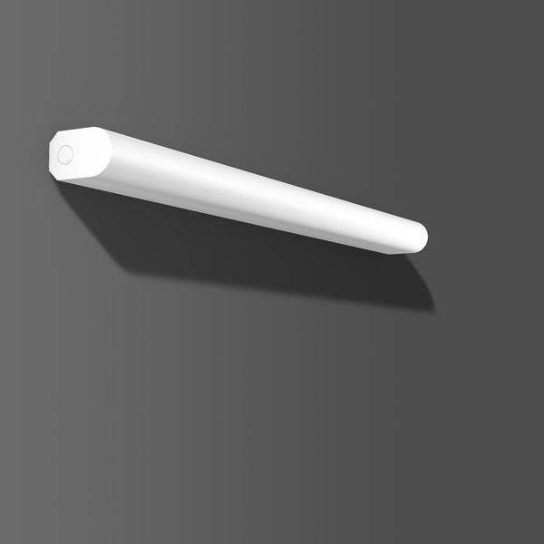 A long, rectangular white light bar mounted on a grey-brown wall, casting a shadow down to the right.