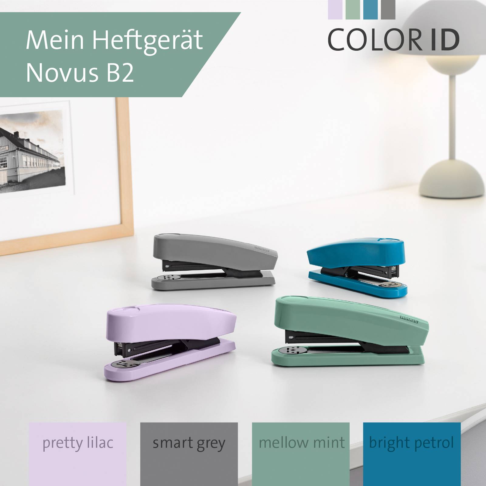 'Three staplers in different colours (Purple, Grey, Mint) on a table. Text top left: My Novus B2 stapler.'
