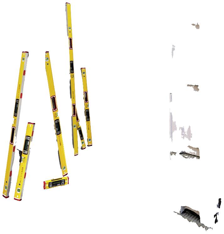 Several yellow spirit levels of varying lengths hover vertically against a white background. They have red and black markings.