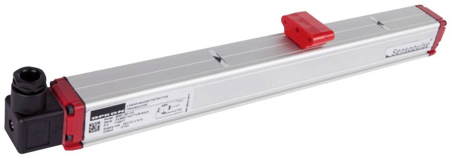 Elongated sensor with a red slider on a metallic housing, marked with technical specifications on the side.