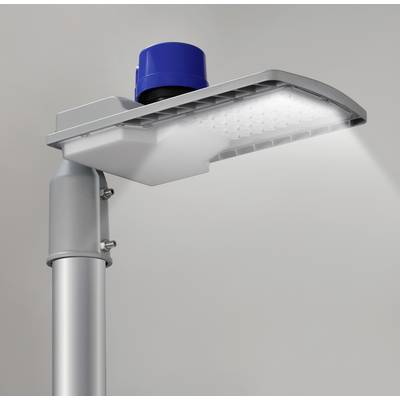A modern LED street lamp with a blue sensor on top, illuminating brightly against a grey background.
