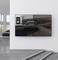 Wall Art Installation: A two-part image depicts a car on a winding country road. Hills can be seen in the background.