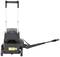 A pressure washer with a handle and hose is positioned upright on two wheels, ready for use.