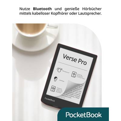 A cup of coffee beside an e-reader with the text 'Verse Pro' on the screen. The text above describes Bluetooth usage.