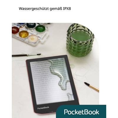 An e-reader with water droplets on the screen lies next to a glass of water and art supplies. Text reads 'Waterproof to IPX8 standard'.