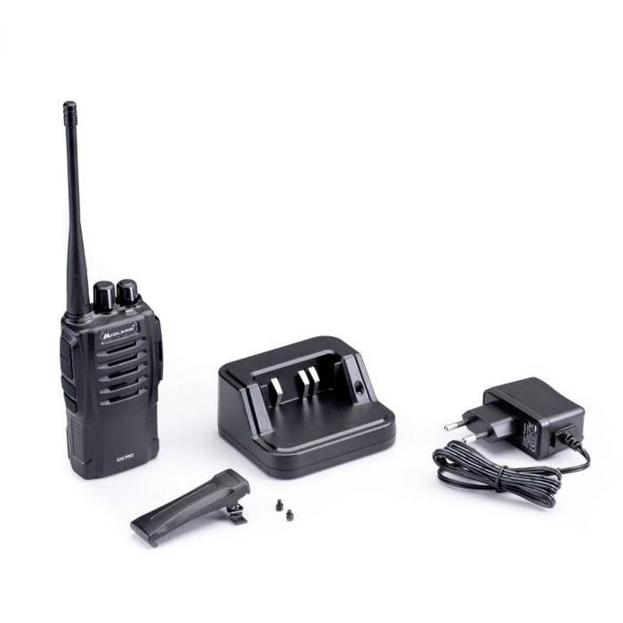 Walkie-talkie set with a radio transceiver, charging station, belt clip, screws and a power adaptor on a white background.