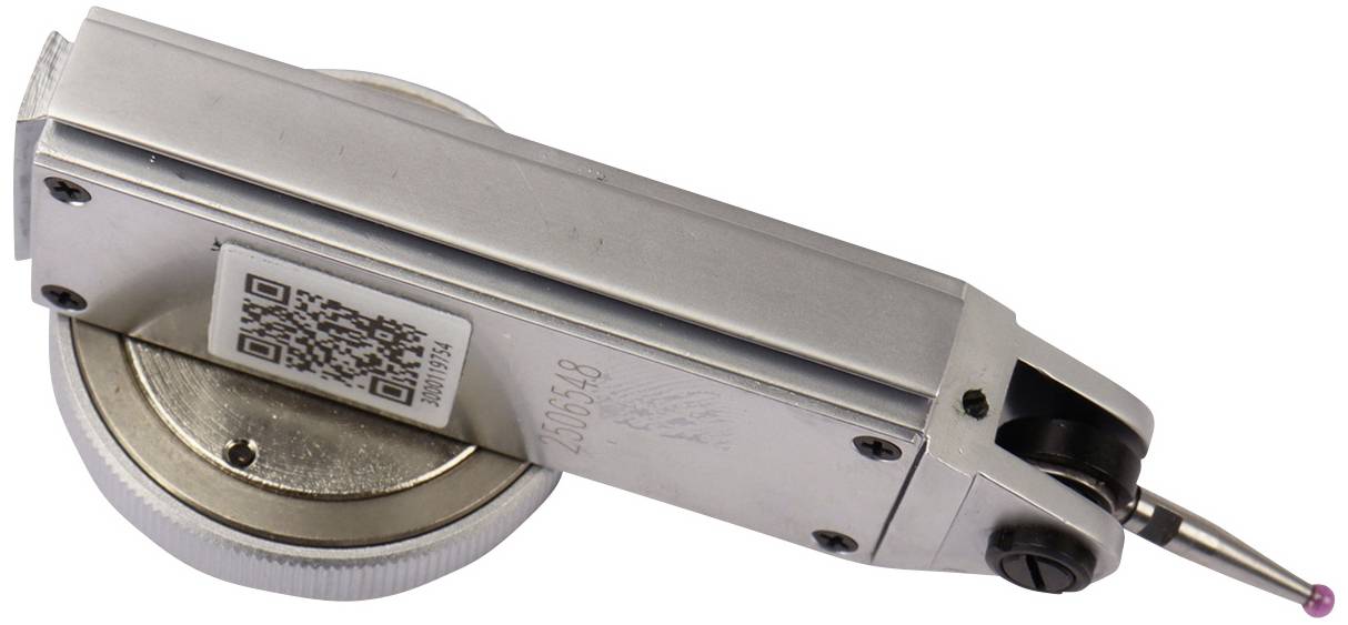 A silver instrument for precise measurement of technical objects, possibly an inclinometer or clinometer.