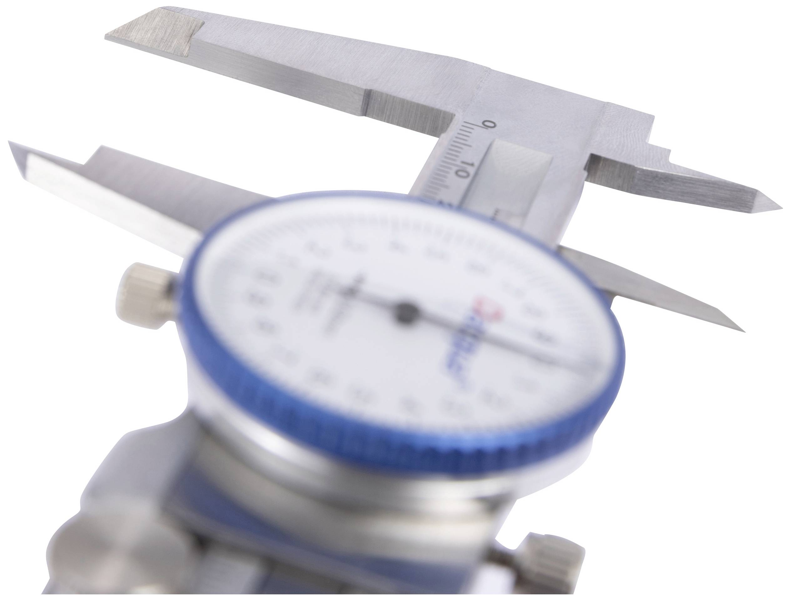 Close-up of a calliper with an analogue dial, showing millimetre measurements. Instrument for precise measurement of objects.