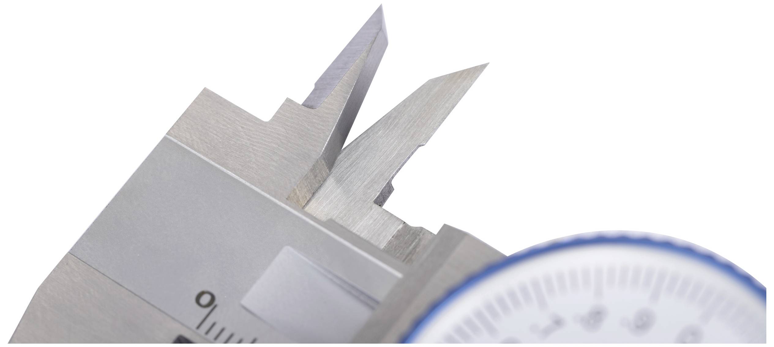 Close-up of a calliper with a circular scale for precise length measurement. Main component of the tool clearly visible.