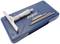 A height depth micrometer with attachments is lying on a blue plastic case.