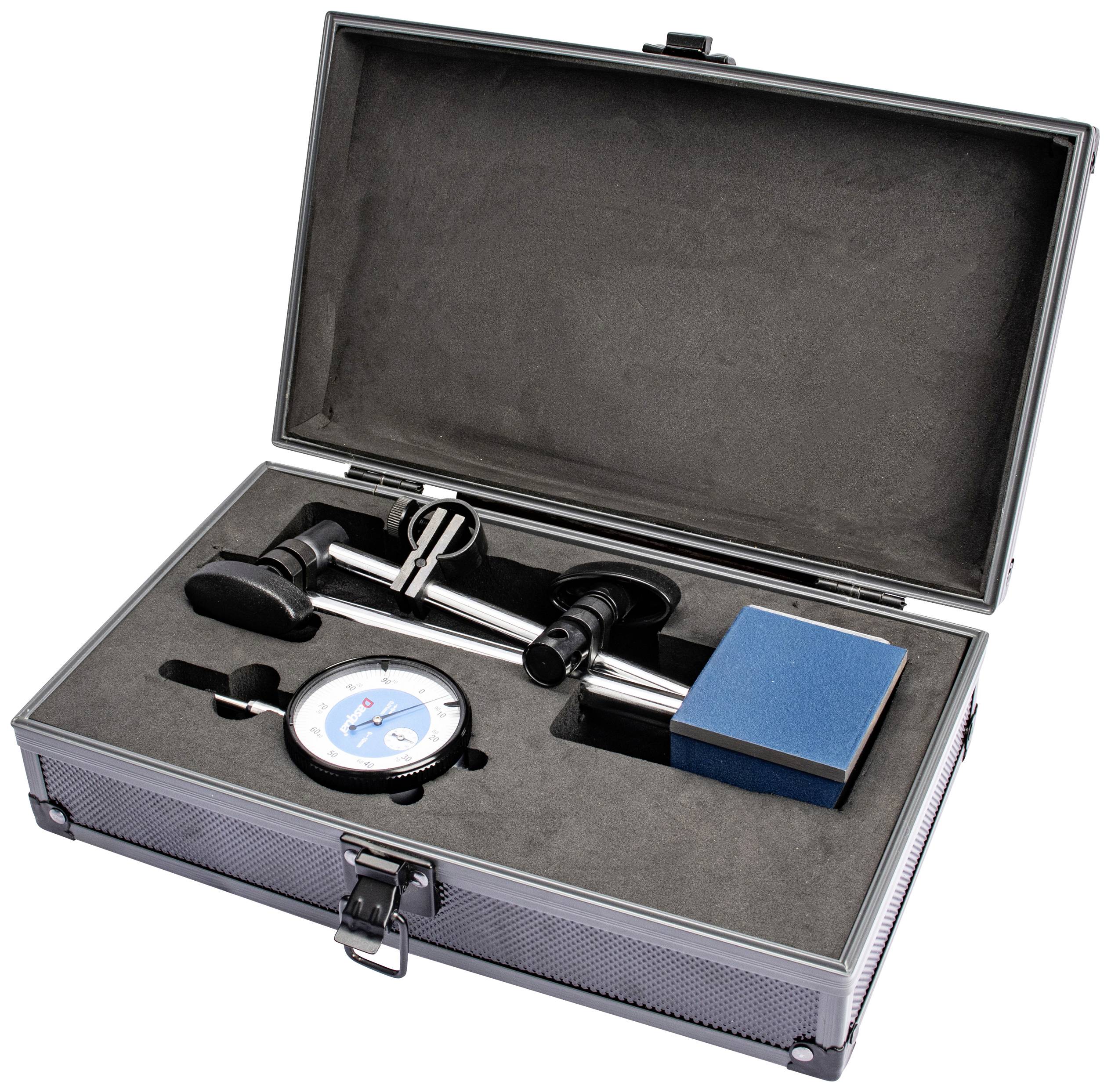 A metal case with a pressure measuring device lies open. Inside are a pressure gauge with a scale and other device components.