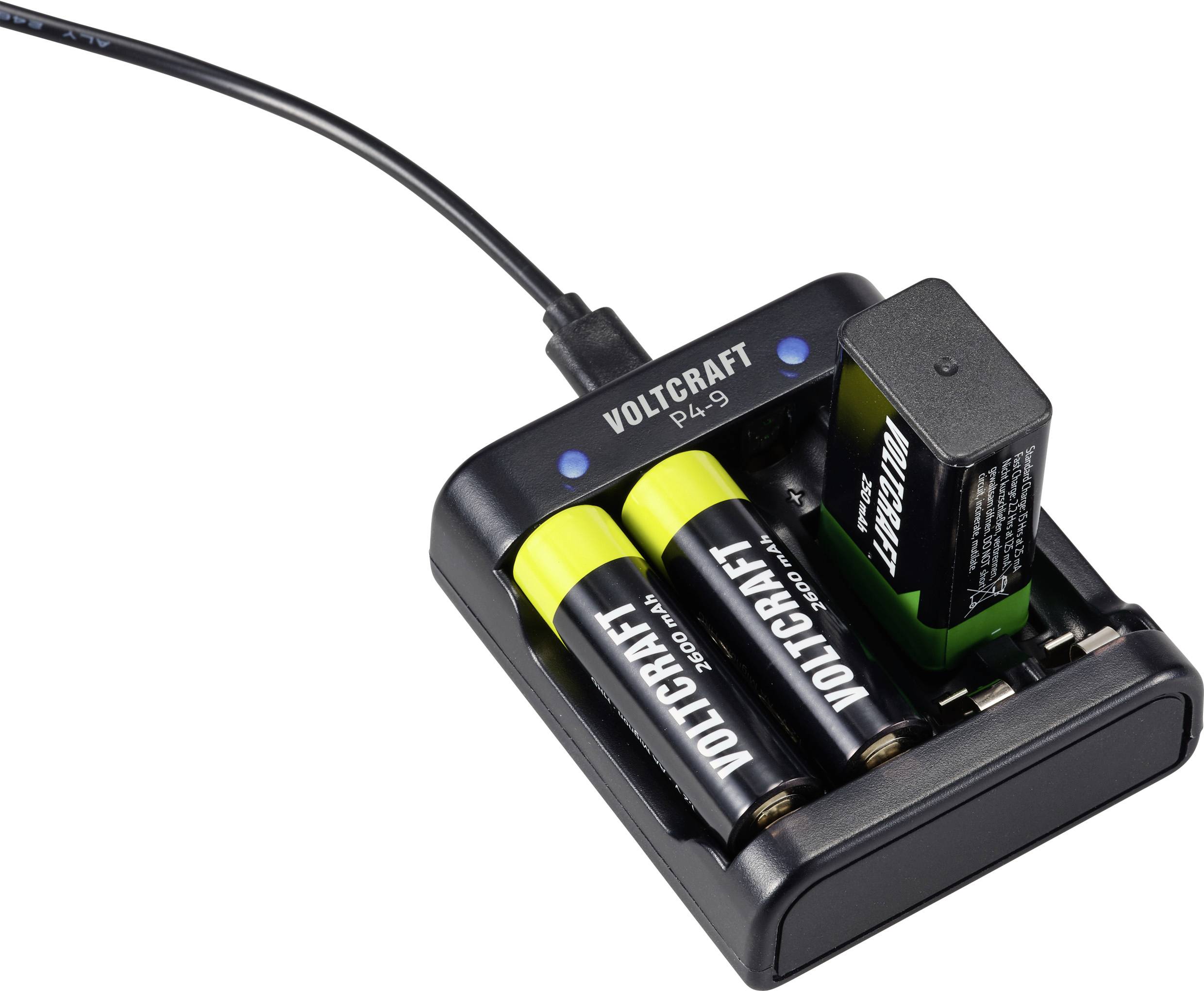 A Voltcraft charger that simultaneously charges two AA batteries and a 9-volt battery.