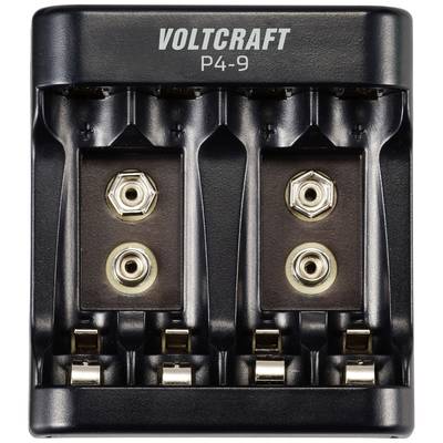 'Battery charger for 9V batteries, Voltcraft brand, Model P4-9, with four charging slots and two visible plug-in positions.'