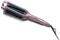 Rose gold hair straightener with wide, black ceramic plates, curved handle, and power cord. Perfect for styling smooth hair.