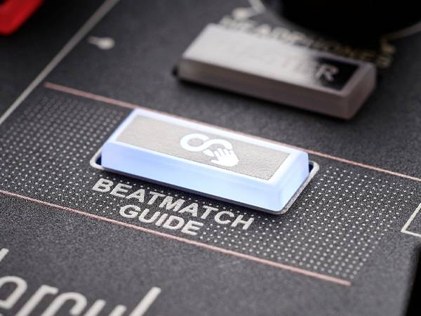 A close-up of a DJ controller shows the illuminated 'Beatmatch Guide' button. It helps DJs with beat-matching.