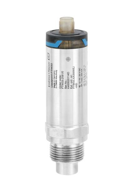 Pressure sensor with stainless steel housing and blue marking on top, connection at the bottom. Used for pressure monitoring in industrial applications.