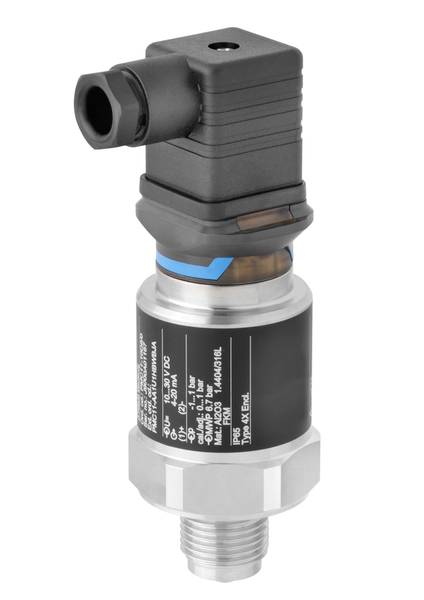 Industrial pressure sensor with a black plastic housing and metal connection, with technical specifications shown on the label.