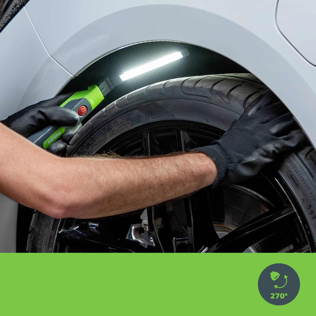 'Close-up of a car tyre, a mechanical arm checks the tread with a device. A green field shows the measurement result of 270°.'
