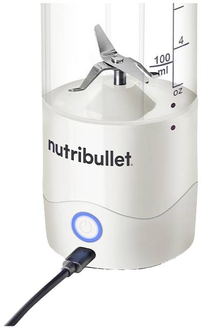 Portable blender with silver blades, measuring scale and connection cable. 'Nutribullet' branding and an illuminated power switch.