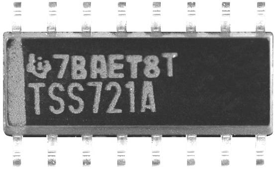 A microchip with the inscription '7BAET8T TSS721A', surrounded by several metal pins. Primarily used in electronic devices.