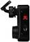'Side view of a black camera with a red button and display mount, showing controls on the side and camera lens at the front.'