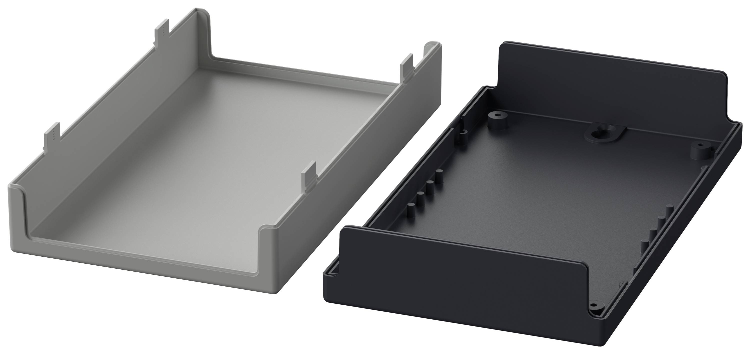 Two empty, rectangular plastic casings in grey and black, standing side by side, with raised edges on the sides.