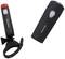 Two black bicycle lights, one with a red light band and mounting loop, the other compact with white light. Both are by Fischer.