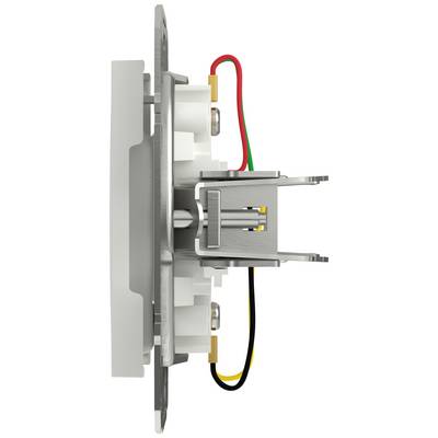 Side view of an electrical switch with visible wiring in red, green, yellow, and black. Primary focus is on the construction method.