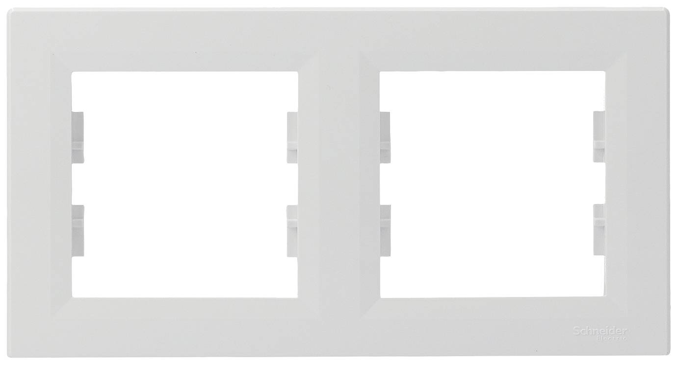 White double plastic switch frames, rectangular, with two openings for wall switches or sockets.