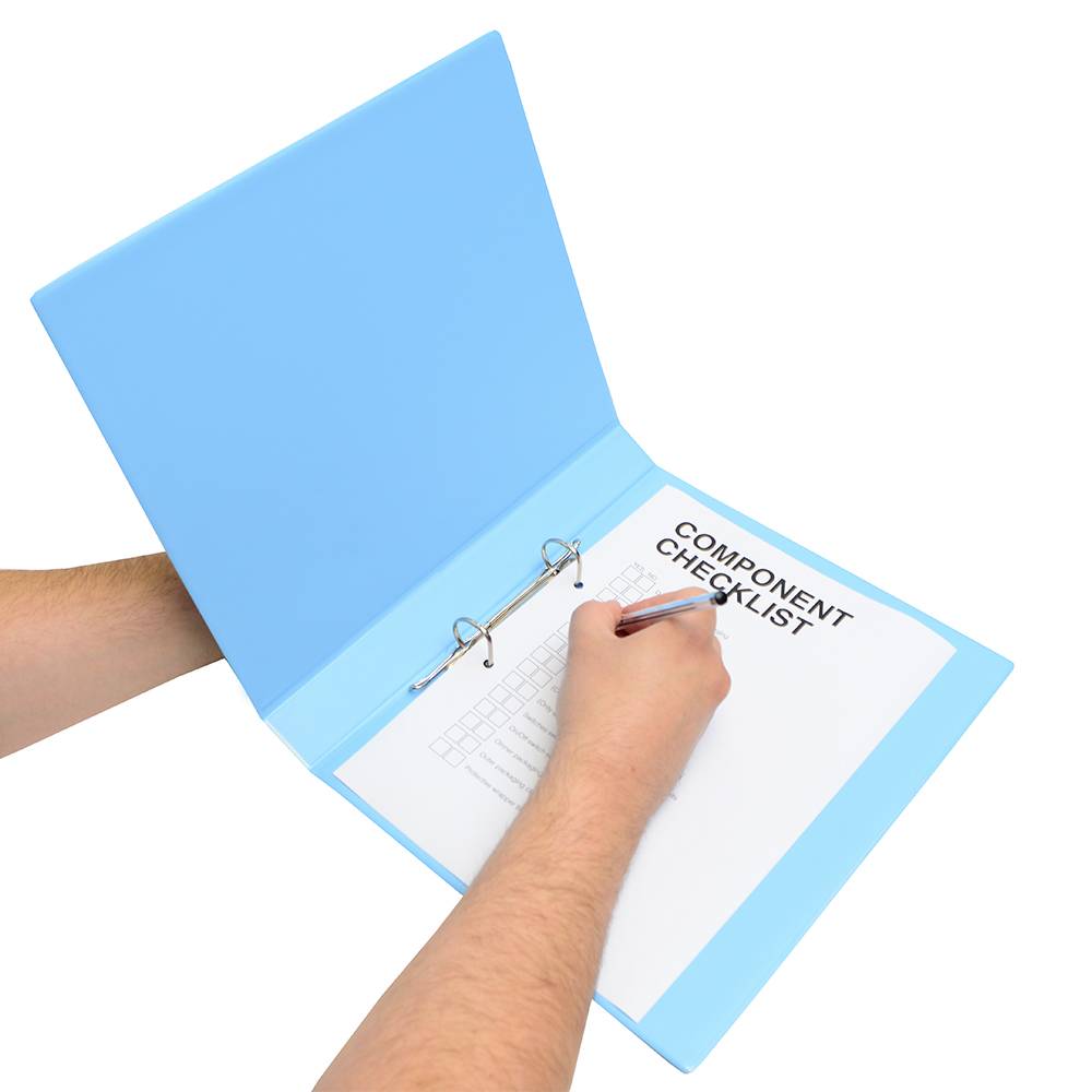 A hand is holding a blue folder labelled 'Component Checklist'. Someone is writing with a pen on a piece of paper inside the folder.