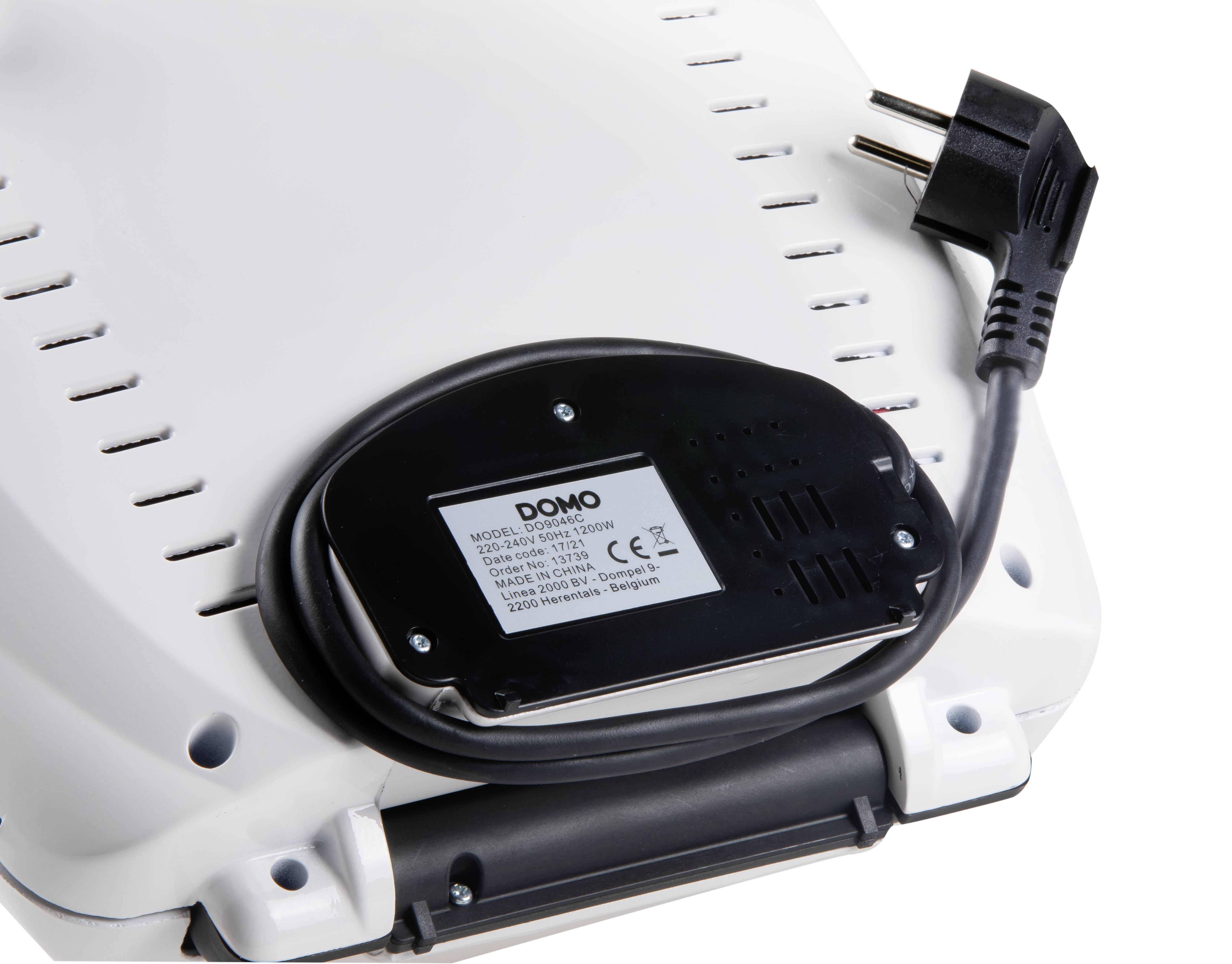 An electrical appliance with a cable and plug. The label displays technical information, CE marking, and voltage specifications.