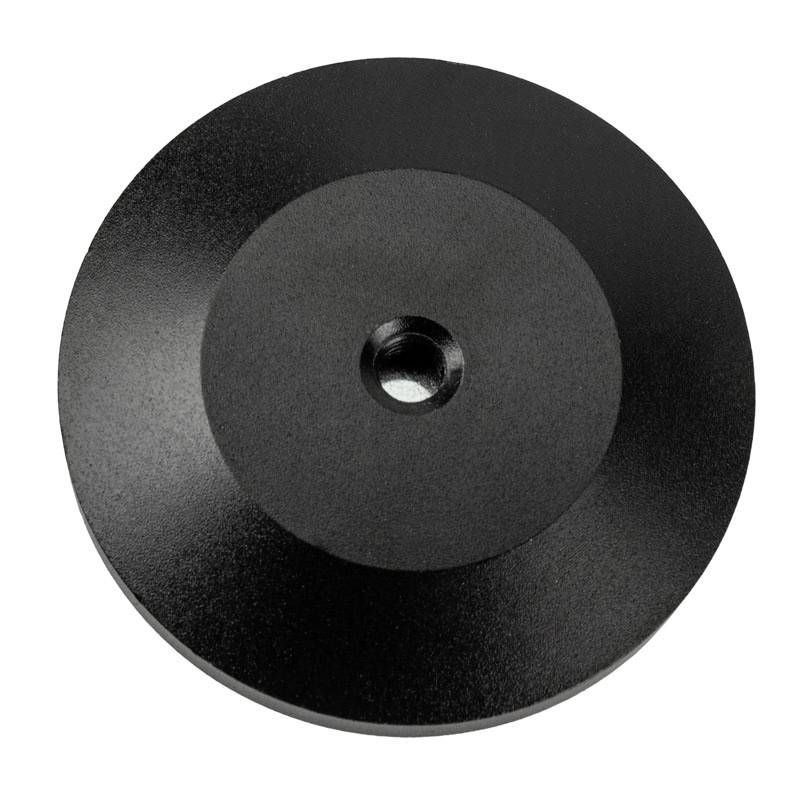 Round metal weight with a central hole, used for various mechanical applications.