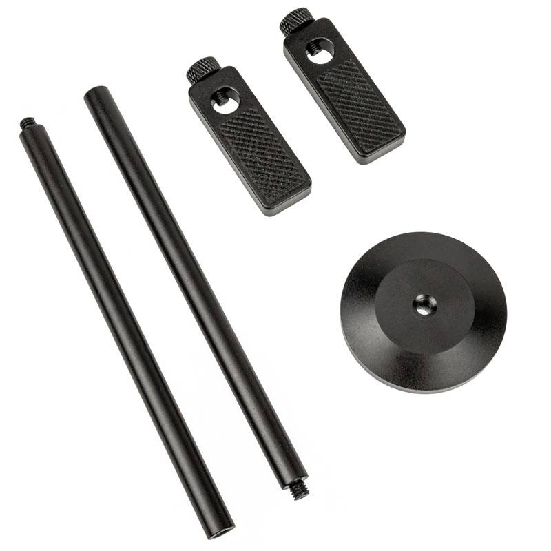 Five black metal components: two long rods, two short adapters, and a round base, possibly parts of an assembly kit.