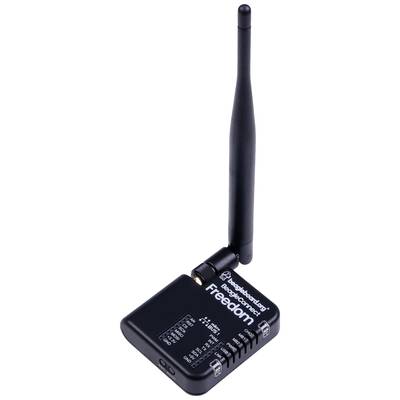 Small, black electronic device with an aerial, labelled 'Freedom'. Functions and switches are visible on the surface.