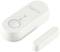 A white, rectangular door and window sensor from sygonix with a large button and LED indicator. Main sensor and small magnet part.