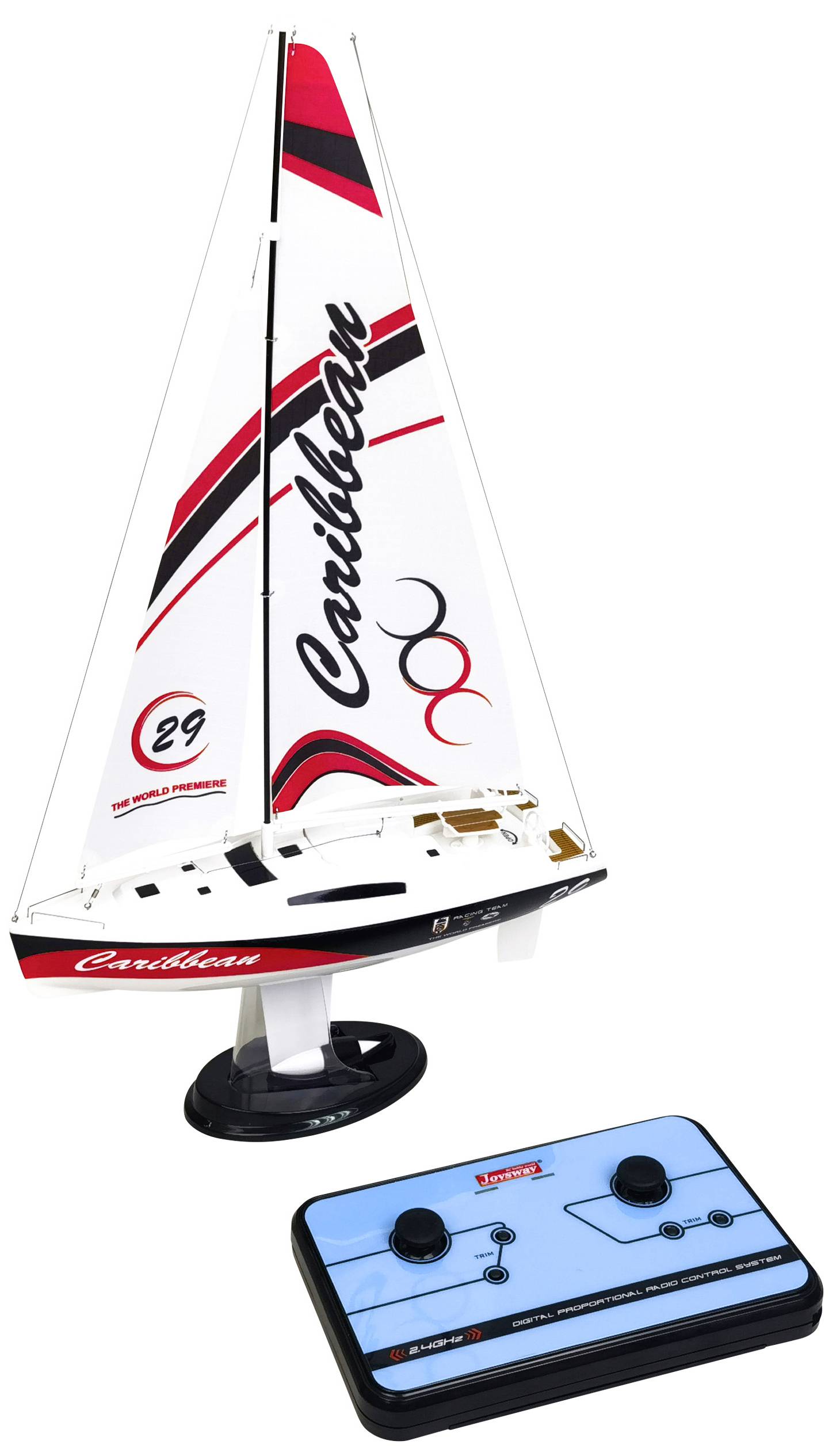 Toy sailing boat with a white hull and 'Caribbean' text on the sail. Accompanying blue remote control.