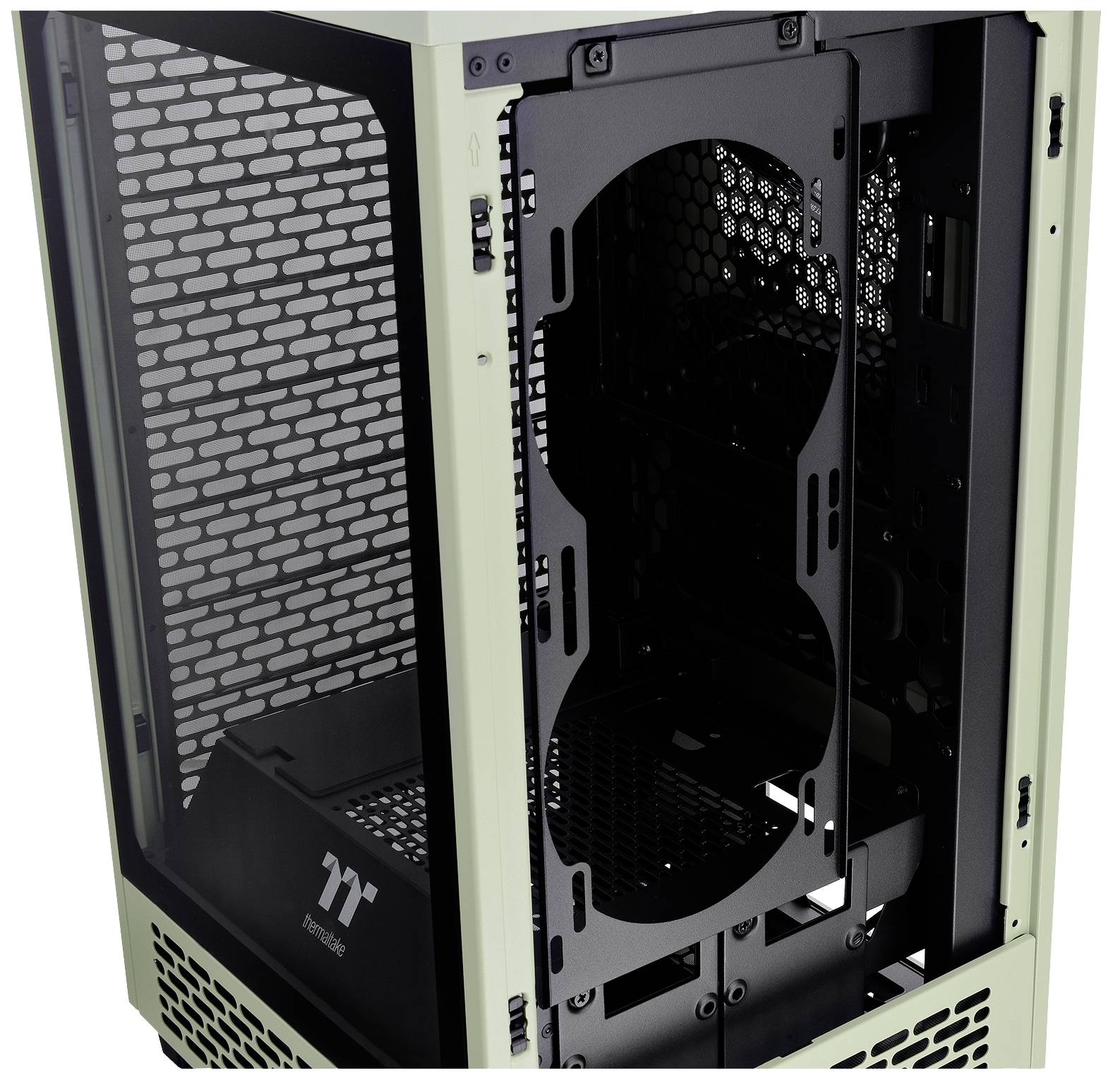 Computer case in a light green colour, open with visible interior. Ventilation grilles on the sides, logo visible at the bottom.